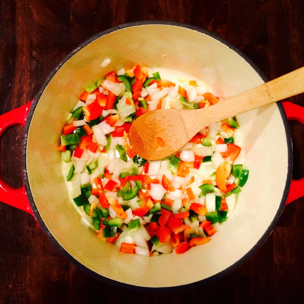 bell peppers and onion in pot